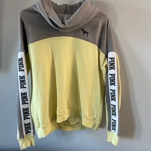 Pink brand, yellow and gray pullover sweater.